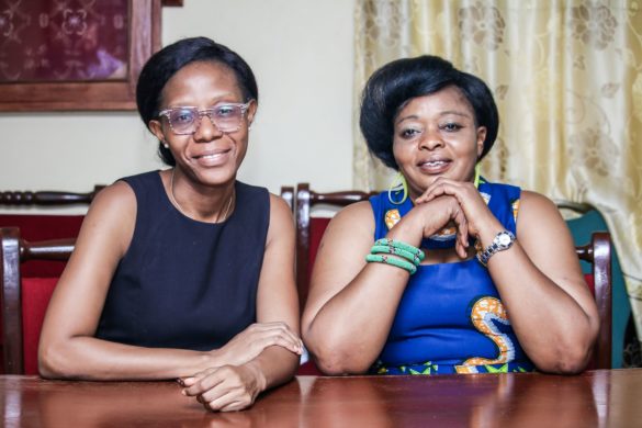 Brenda Stafford, left, and Anitta Kamara, right, of the Sierra Leone National Malaria Control Program.